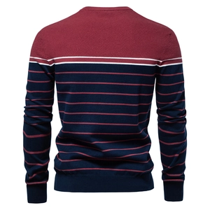 Detail view of the back of a men's knit sweater featuring burgundy and navy stripes