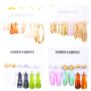 Exaggerated geometric C-shaped resin earring set with retro hoop and pearl designs