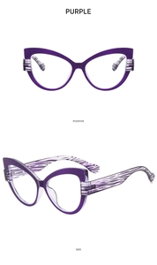 Detail view of purple cat-eye frames with stylish black and purple striped temples