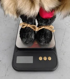 Detailed weight measurement showing 430.1g for the 18 inch Santa Claus figurine on a scale