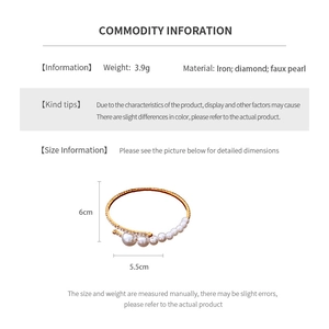 Detail specifications of gold cuff bracelet featuring half faux pearls and half rhinestones