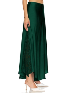 Detailed view of dark green satin midi skirt with elegant side lace inserts