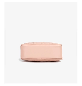 Flat base detail of pink quilted PU shoulder bag with high-quality stitching craftsmanship