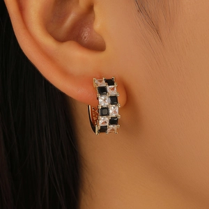 Fashionable gold checkerboard huggie earrings with black and white square zircons for women