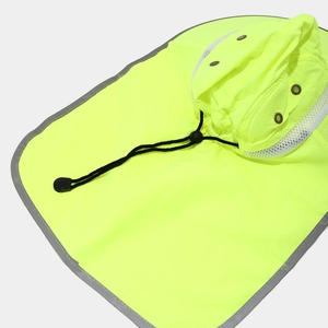 Detail of high-visibility safety hat with reflective stripes and breathable mesh