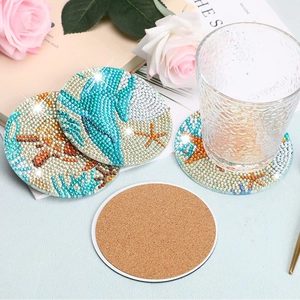 Detail view of DIY 5D diamond painting coasters with marine patterns and cork backing