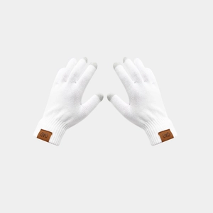 Close-up of white knitted gloves featuring grey touchscreen-compatible fingertips and label