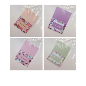 Floral assorted greeting cards with Good Luck and Thank You messages on a light background