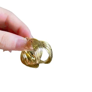 Chic gold multi-layer twisted hoop earrings with a textured weave and polished finish
