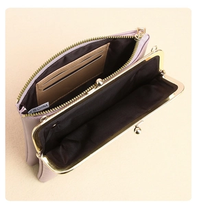 Detail view of pink PU leather crossbody bag showing dual compartments and card slots