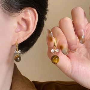 Retro bow earrings with brown tiger eye stone beads and sparkling zircon stones