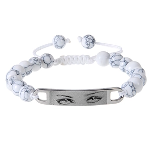 Close-up of white turquoise bead bracelet with adjustable cord and silver eye charm