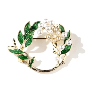 Gardenia flower wreath brooch with green enamel leaves and white pearls on gold base