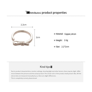 Detail showing the dimensions and materials of the silver bow ring with zircons
