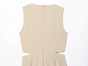 Detail view of khaki sleeveless midi dress with back zipper and side cut-out design