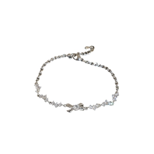 Elegant silver butterfly bracelet with sparkling zircon stones on a clean white background