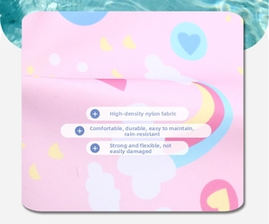 Waterproof high-density nylon fabric detail of a pink school bag with cute patterns