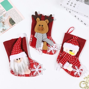 Set of 3 red festive Christmas stockings with Santa Claus Reindeer and Snowman patterns