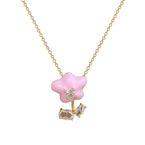 Elegant gold titanium necklace with pink enamel flower pendant and zircon accents