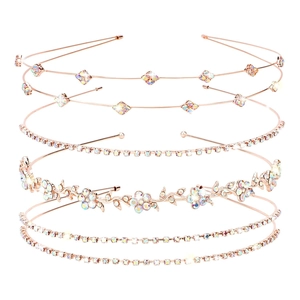 Rose gold bridal headband set with pearls and rhinestones on a white background