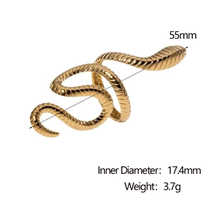 Macro view of gold snake ring showing scales texture with 17.4mm inner diameter specs