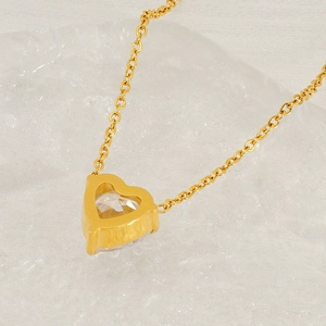 Chic gold stainless steel heart pendant necklace with a sparkling clear zircon stone