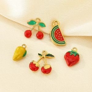 Detailed close-up of fruit pendants including cherry, watermelon, strawberry and mango charms