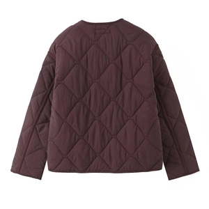 Rear view of deep purple quilted jacket featuring classic diamond stitching and crew neck