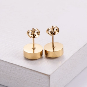 Classic round gold plated titanium steel earrings for women with a minimalist design