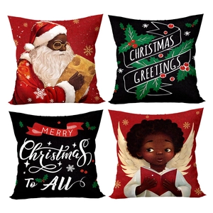 Set of four Christmas pillow covers featuring black Santa Claus and holiday greetings