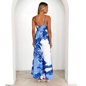 Blue and white floral summer maxi dress with backless halter neck and high waist silhouette