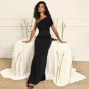 Elegant black one-shoulder maxi dress with lace cut-out waist and ruched bodycon fit