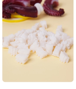 Macro shot of miniature PVC squid slices with realistic carved texture and white finish