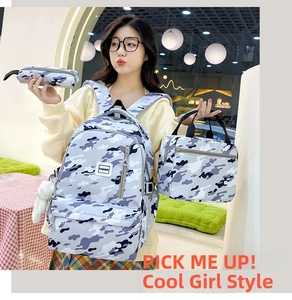Three-piece school backpack set featuring blue camo print with lunch bag and pencil case