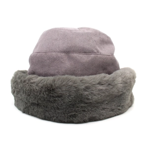 Winter women's purple suede bucket hat with thick grey faux fur trim for warmth