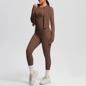 Deep brown three-piece yoga set showing zip jacket, tank top and high-waist leggings
