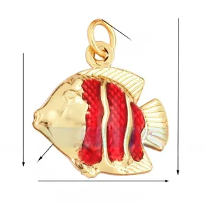 Detail of 21mm gold-plated tropical fish pendant charm with red enamel stripes