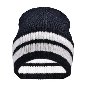 Close-up of the thick ribbed knit texture and black and white stripes on this wool beanie