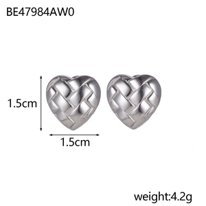 Detailed view of silver heart-shaped woven earrings measuring 1.5cm with steel studs
