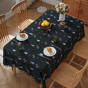 Black Christmas tablecloth with white reindeer embroidery and decorative black tassels