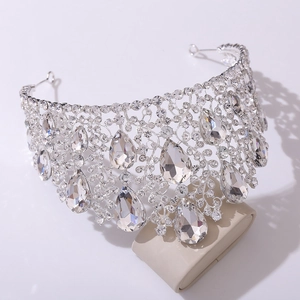 Macro shot of silver bridal crown featuring teardrop crystals and brilliant rhinestones