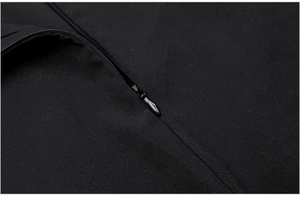 Detail of hidden black zipper and fine stitching on a high-waisted winter suit jacket
