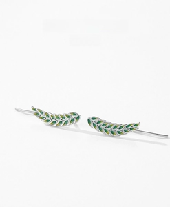 Detailed macro shot of S925 sterling silver leaf ear cuffs with green gradient enamel finish