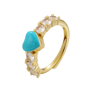 Adjustable gold plated ring featuring a blue heart stone and sparkling zircon accents