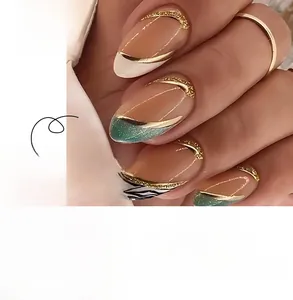 Detail of almond press-on nails with green marble gold foil and zebra pattern