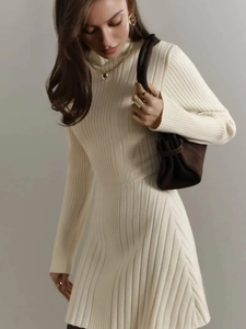 Elegant cream knit long sleeve dress with mock neck and A-line ribbed silhouette