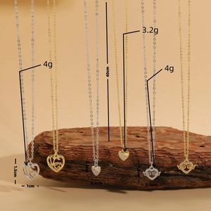 Gold and silver heart angel wing zircon pendant necklaces with dimensions displayed