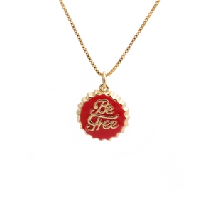 18K gold plated necklace with red enamel bottle cap pendant featuring Be Free text
