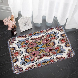 Bohemian mandala patterned rectangular flannel rug on dark wood floor with sunlight