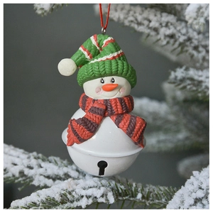 Detailed knit snowman Christmas tree ornament with a green bell on a snowy pine branch